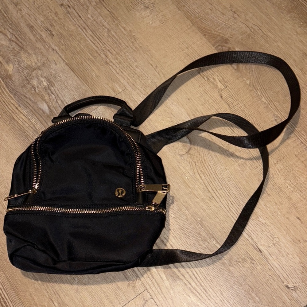 lululemon athletica Black Backpack with Gold Accents